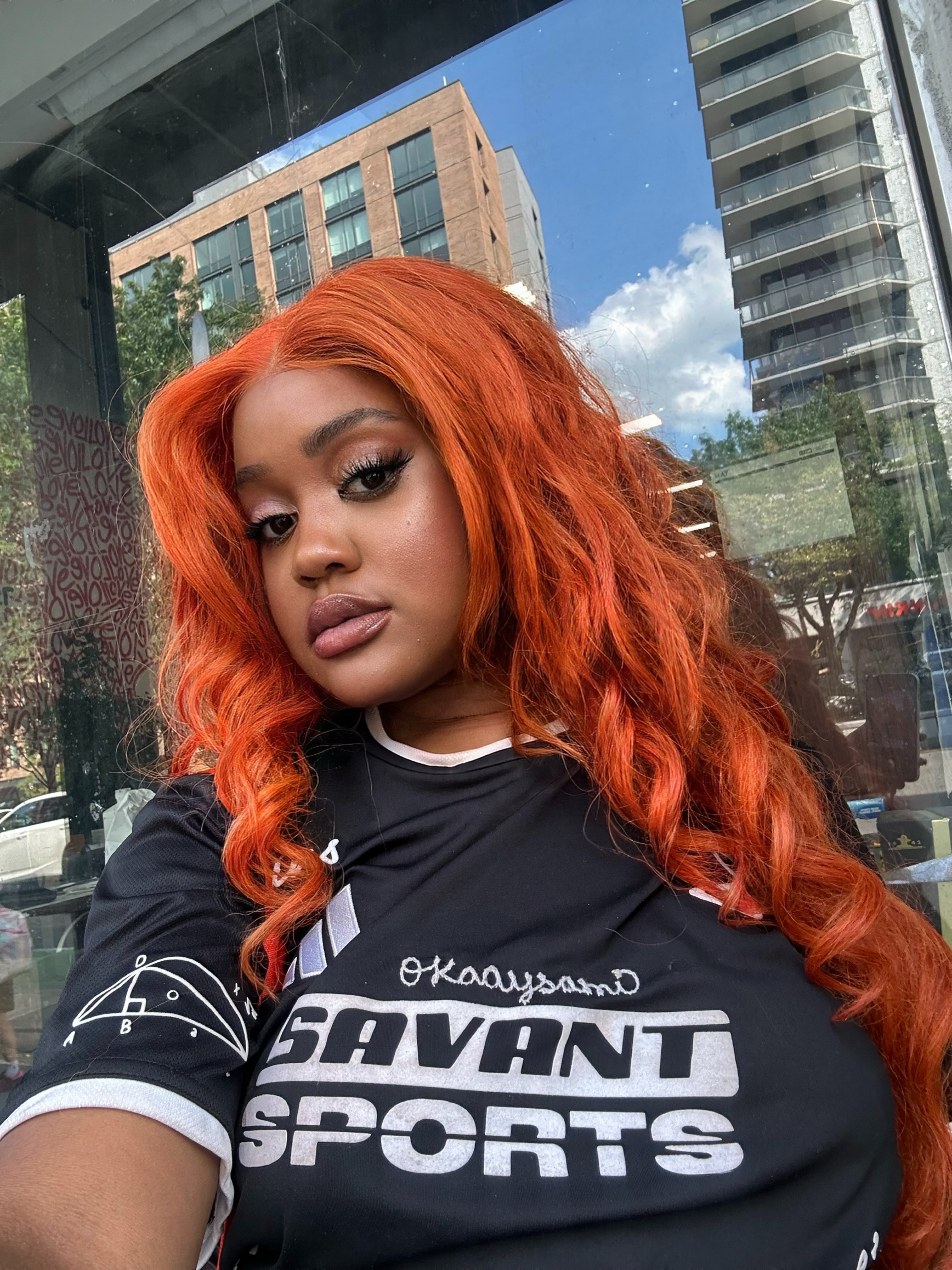 Samantha Samaka aka OKAAYSAMi — fiery orange hair, SAVANT SPORTS look